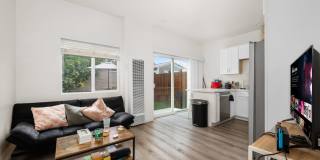 Spacious master bedroom with balcony! Gallery 1