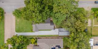 Completely remodeled like new Gingerbread midtown cottage with gleaming hardwoods, converted from a 3/1 to a 3/2. Gallery 48