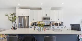 Perfectly positioned near the vibrant shopping and dining destination of One Loudoun, this residence delivers both style and accessibility. Perfectly positioned near the vibrant shopping and dining destination of One Loudoun, this residence delivers both style and accessibility. Gallery 10