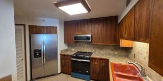 Rarely available 1-bedroom, 1-bathroom luxury apartment in the Punahou Cliffs Condominium. Gallery 3