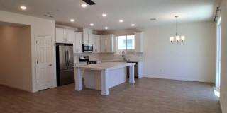 SPECIAL: HALF OF FIRST MONTH'S RENT! Solar Included! Spacious Single-Story Fresno Home with Den & 2-Car Garage! Gallery 1