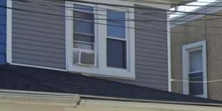 Twin home with updated kitchen, washer/dry on first floor, private back yard and porch. Gallery 1