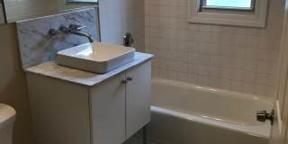 NO FEE LUXURY DUPLEX near T w 2 FREE Parking spaces and NO BROKER FEE.  Laundry in Unit, Central A/C, Near T Gallery 4