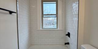 Rare 2-Full Bath Find: Pristine Renovation with Designer En-Suite & Granite Gallery 15
