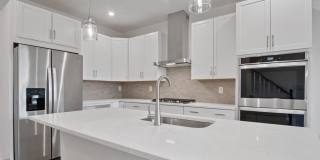 This stunning luxury 2-story condo has 3 beds & 2.5 baths with over 1500 sq ft of living space. Gallery 8