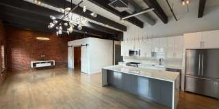 Prime Fort Point 1BR Condo – Steps from Seaport & South Boston w/ Garage Parking Gallery 1