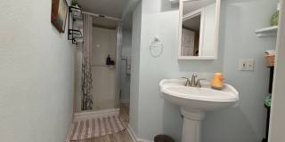 Quiet Ranch Retreat Steps from Light Rail with Finished Basement & Designer Kitchen Gallery 14