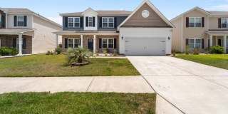 Spacious 5-Bedroom Home in The Palms at New Hampstead with Office & Screened Porch Gallery 1
