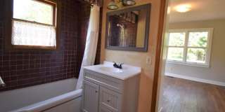 4 bed/3.5 bath, half acre lot, 100 yards from Memorial Stadium! Gallery 7