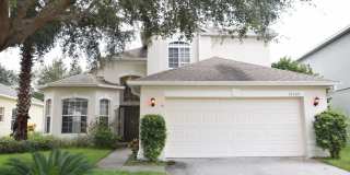 AMAZINGLY SPACIOUS 4-Bedroom Home with Loft in Gated Northshore at Lake Hart – Golf, Tennis & Lake Access! Gallery 1