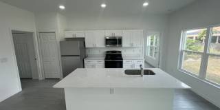 New 4 Bed / 2 Bath / 2 Car Garage Family Retreat in Desirable Lehigh Acres! Gallery 12