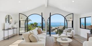 Completely Remodeled, Custom 4BR3.5BA Hilltop Home w/ Incredible Panoramic Ocean/Whitewater/Coastline Views, Open Top Floor Living Space w/ Large Balcony, Beautifully Landscaped Outdoor Space for Indoor/Outdoor Living & Large Driveway + 2-Car Garage! Gallery 1