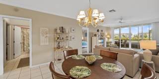 first-floor unit featuring a 2 bedroom, 2 bath fully furnished Gallery 8