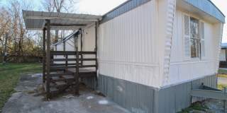 Discover comfortable country living in this nicely updated trailer located just minutes from Fayetteville, TN Gallery 1