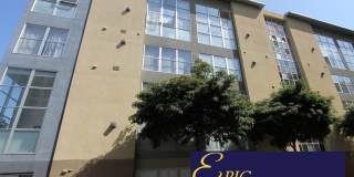 EPIC REA: Spacious Live/Work  Loft in SOMA with Rooftop Views Gallery 1
