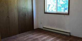 Charming 2-Bedroom Condo Near MSU – Pet Friendly- NEW LOW PRICE Gallery 1