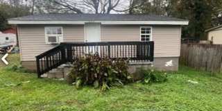Charming 2BR Home with Large Front Porch & Spacious Kitchen Gallery 1