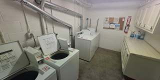 RENOVATED 2BD/1.5 BATH WITH PARKING, LAUNDRY, AND FULL H-VAC WITH MOVE IN SPECIAL!! Gallery 32