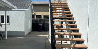 JUST REDUCED!!! Spacious 2 Bedroom + Bonus Room, Back House w/ Garage & Gated Entry Gallery 15