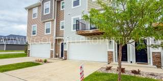 Modern Ankeny Townhome with Two Primary Suites & 2-Car Garage Gallery 1