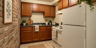 Cozy One Bedroom Apartment! Exposed Brick, Off-Street Parking & More! Call Today! Gallery 1