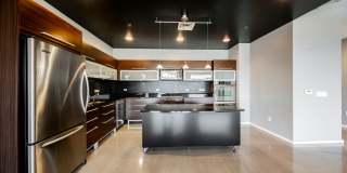 Modern Industrial Loft at Soho Lofts – 1BR/2BA High-Rise in the Arts District, City & Mountain Views! Gallery 19