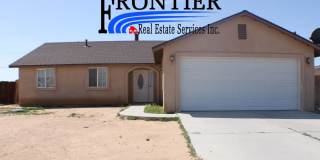 Charming 3-Bedroom Home with Fireplace, Spacious Backyard & Attached Garage in California City! Gallery 1