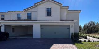 Modern 3-Bedroom Townhome in Gated Poinciana with Included Utilities! Gallery 1