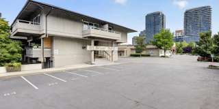 Fully Renovated Sun-Filled Downtown Bellevue Condo with Dual Balconies & Prime Walkable Location Gallery 1
