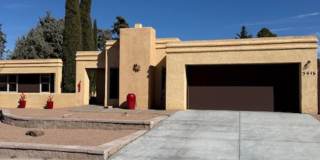 Beautiful NE Heights Neighborhood Executive style home with a Large back yard that has a full size pool. Gallery 1