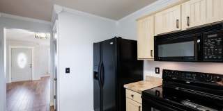 Modern Elegance: 3-Bedroom Townhome with Wood Flooring, Shaded Deck, and Inclusive Amenities Gallery 12