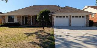 Beautiful Brick Home with Inviting Living Spaces & Sunroom Gallery 1