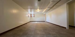 Bi-Level House w/ Massive Backyard, Storage, & Character! Gallery 17