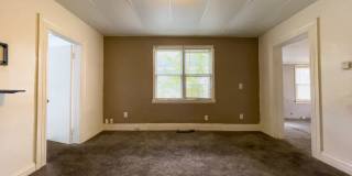 For Rent: 912 S Penn St. Cozy 3-Bedroom Home with a fenced in yard & detached garage! Washer & Dryer Hookups! Section 8 Approved! Gallery 7