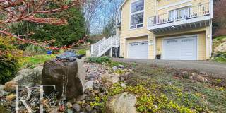 Light-Filled View Home with Vaulted Ceilings & Warm Wood Finishes Gallery 1