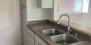 Updated 3 Bedroom, 2 Bath Pet Friendly Home with a Garage, Yard, and Central AC Gallery 1