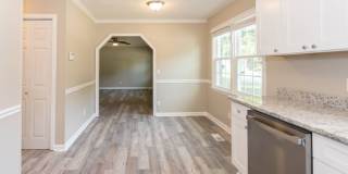 Welcome to this beautiful newly renovated 3-bedroom brick ranch! Gallery 11