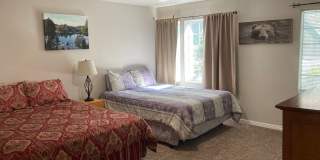 Location! Location! Terrific Four bedroom Three Bath Home with Two Car Garage including Lake Rights! Gallery 15