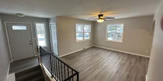 Spacious 4 Bed, 2 Bath Home with Fenced Yard, Deck & Garage Gallery 1