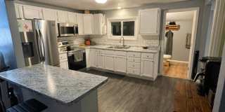Beautifully updated with modern upgrades and cozy charm. PETS WELCOME Gallery 23