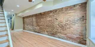 Charming Baltimore Rowhome with Exposed Brick & Private Patio Gallery 4