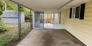 Charming 2BR Home with Enclosed Porch, Carport & Storage Shed Gallery 3