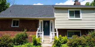 Charming Split-Level Home with Bright Interiors and Spacious Backyard Gallery 1