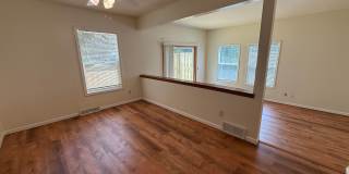 August 15th rent special! New deck! 3 Bedroom, updated kitchen, updated flooring, garage, driveway, and fenced yard - 9 month lease available! Gallery 11