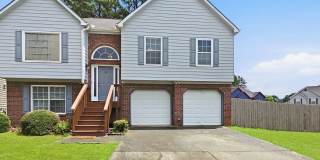 Spacious 4BR Home with Private In-Law Suite in Powder Springs Gallery 1