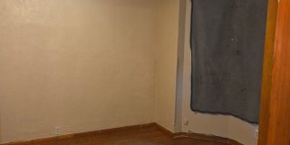 5BR/1.5BA Row Home with Backyard and Laundry Hookups Gallery 8