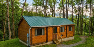 Furnished Artisan Small Log Cabin for Rent in Mountain Community Gallery 1