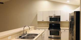 Experience this Cape Coral 3 bedroom 2 bath duplex with 1 car garage and screened in lanai. Gallery 7