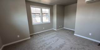 4 Bedroom / 4 bath New Townhome. Every bedroom is its own Master Suite with your own full bathroom, walk in closet and A/C unit. Full-size washer and dryer in your unit. Gallery 16