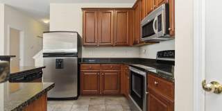 Relax & Unwind in this Spacious End-Unit Townhome Gallery 14